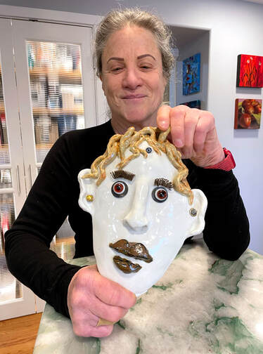 Jill Drllevich with one of her masks